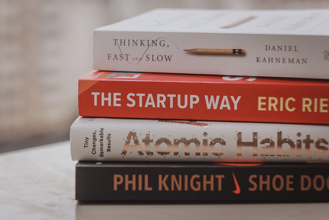 Stay motivated in your God-centered business by reading a stack of books 