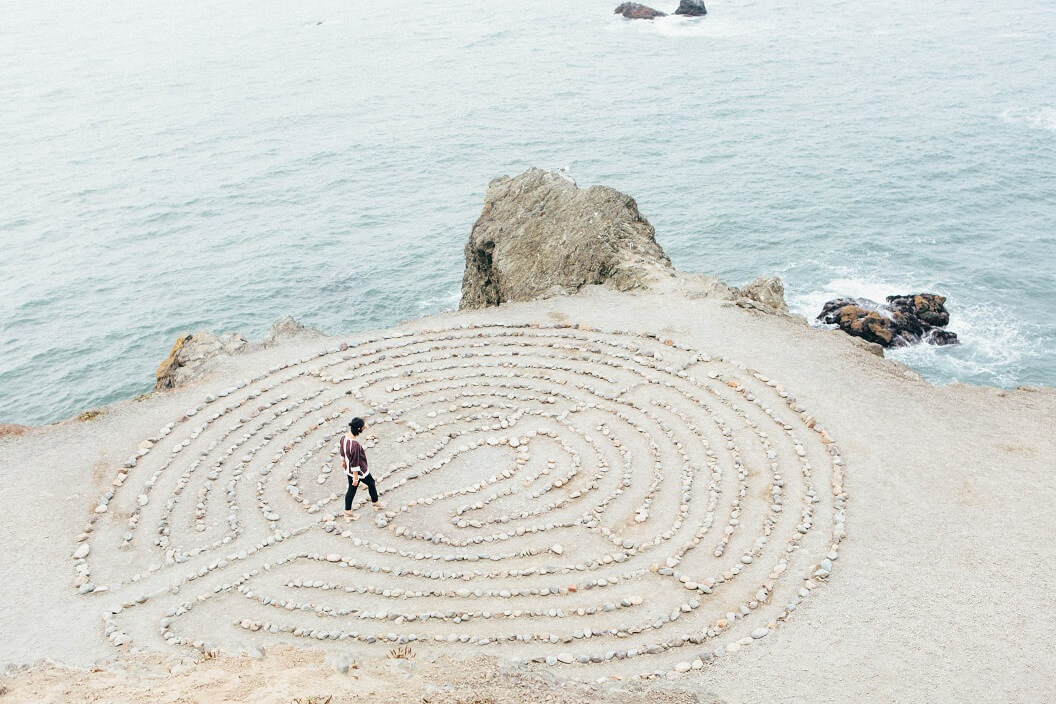 How to Deepen Your Relationship with God picture of a woman walking in a labyrinth