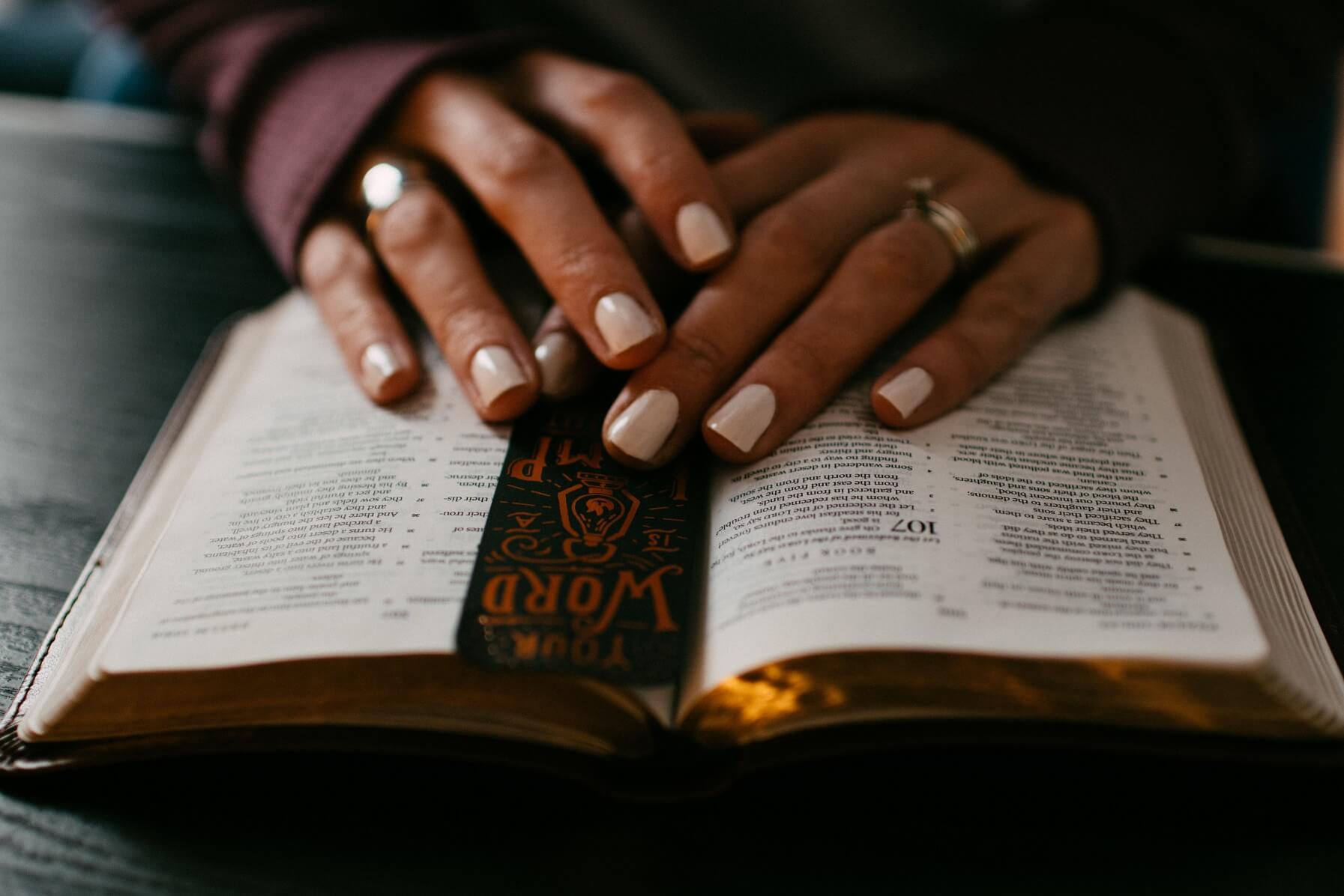 Woman sitting reading the Bible