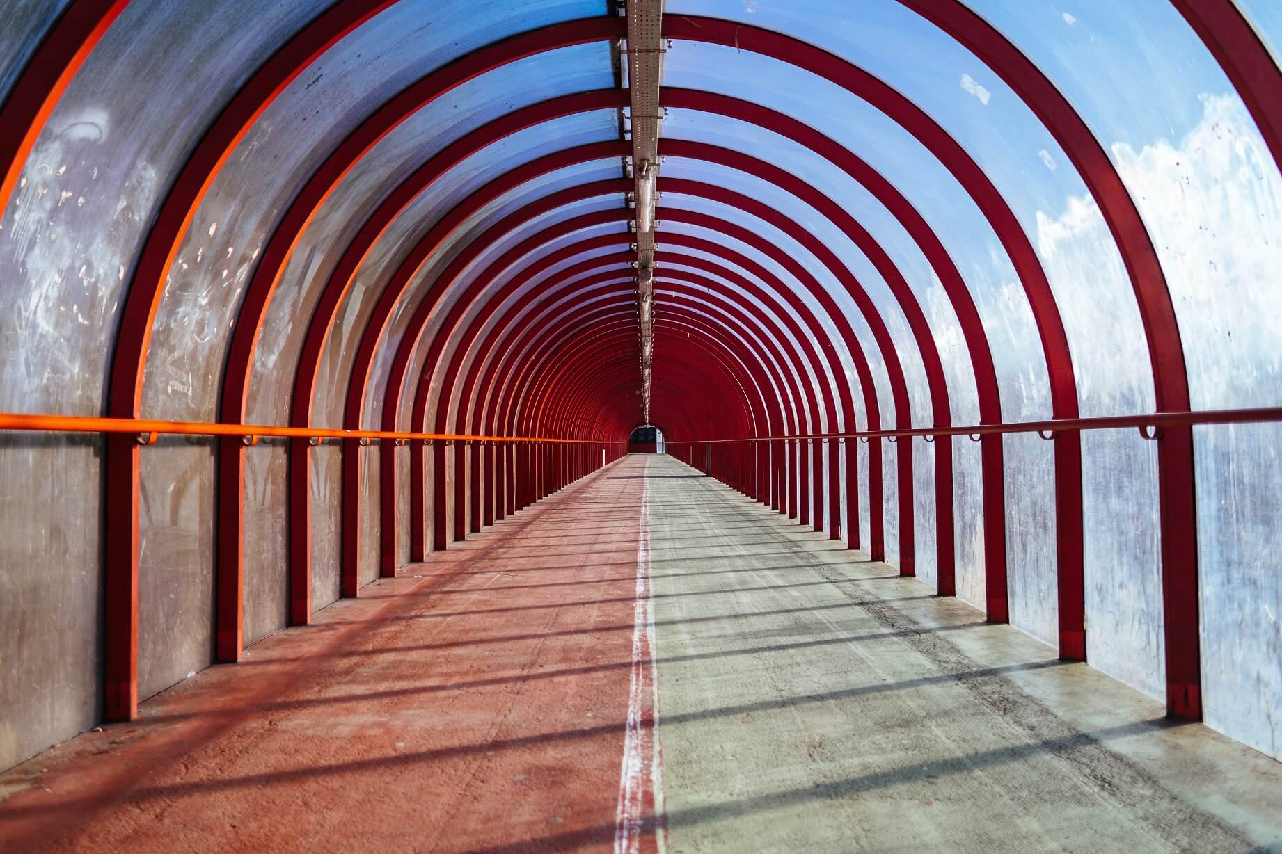 Choosing the Right Path When in Transition street overpass with red beams