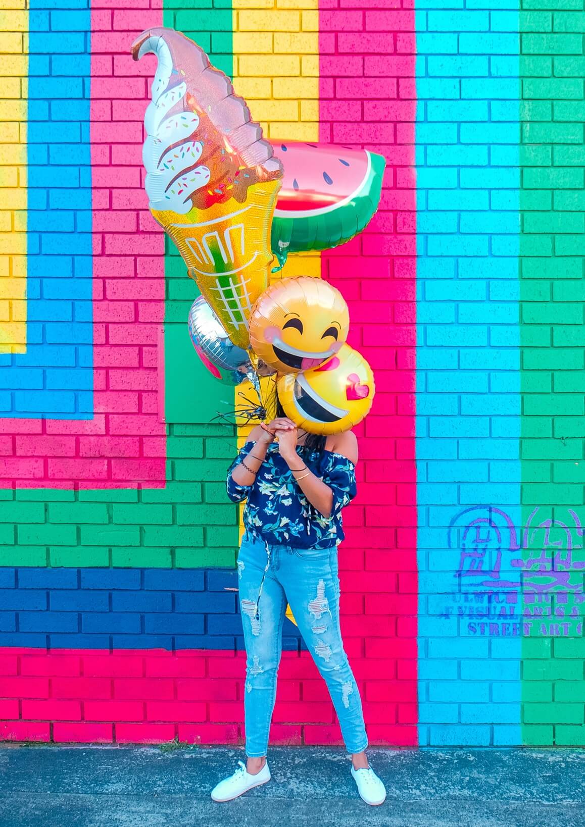 woman carrying ballons to celebrate your successes