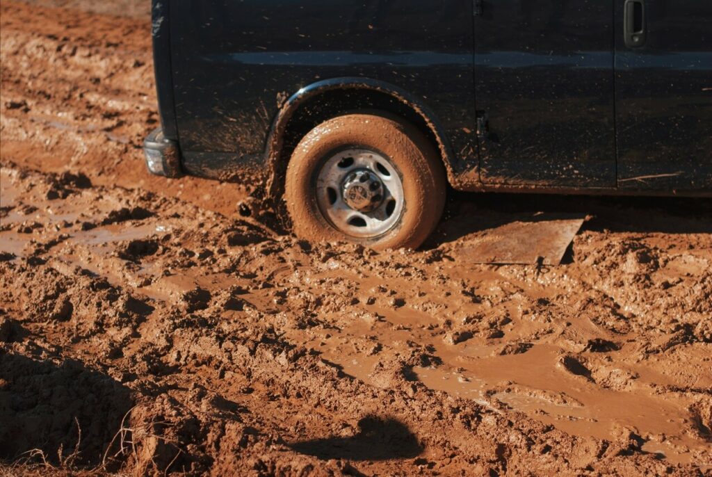 Truck stuck in the mud for blog post How To Overcome Analysis Paralysis
