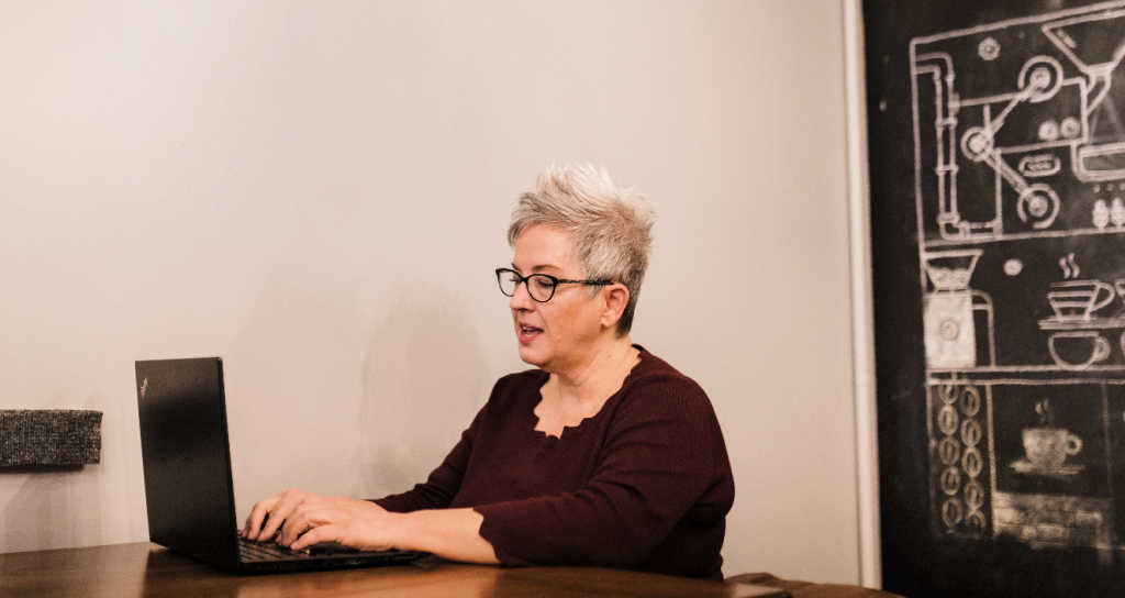 Woman at the computer during the Christian co-working community