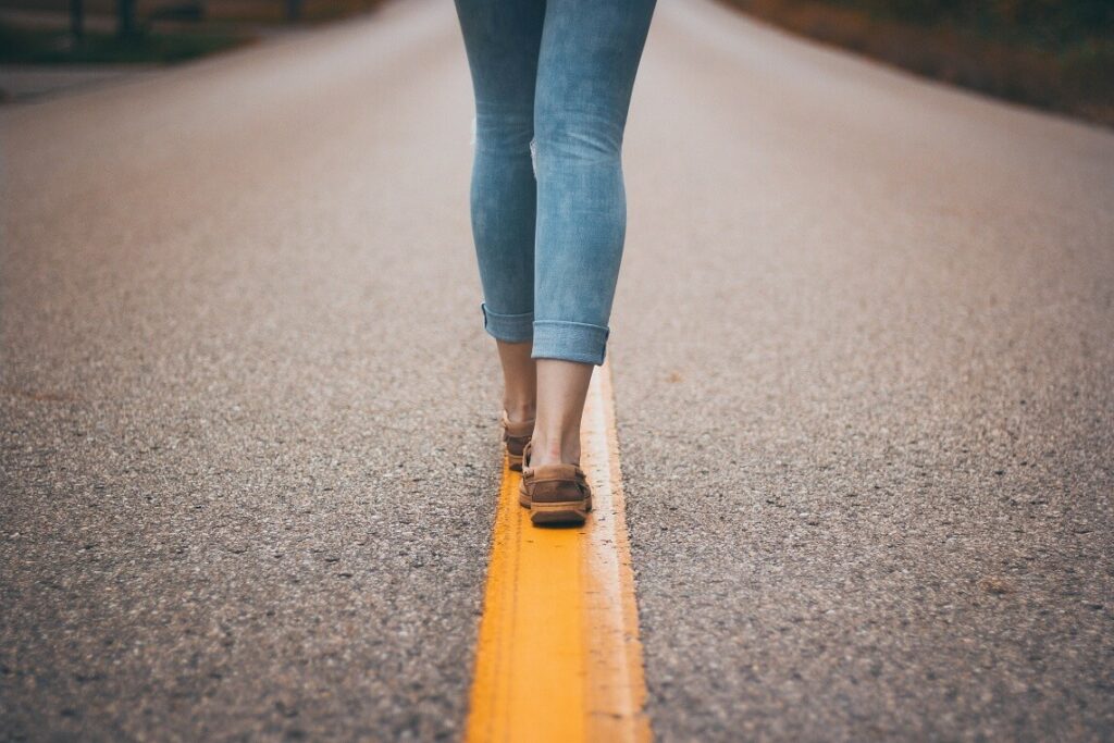 Woman walking a straight line to show how to focus